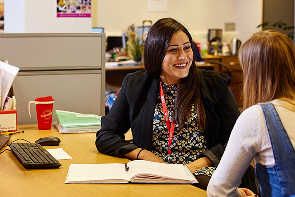 Careers advisor speaking to student
