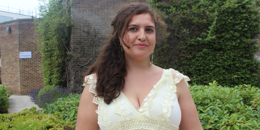 University Doctor stood in front of building