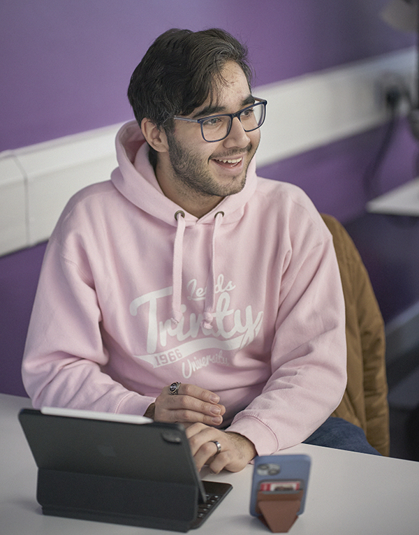 Student working on tablet in seminar