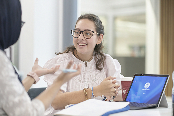 Student receiving advice or support from tutor