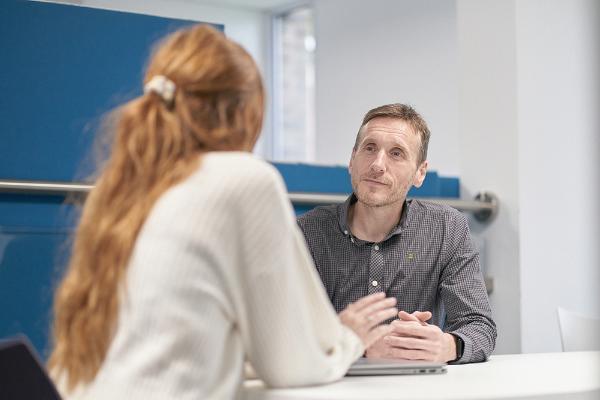 Student receiving support from adviser